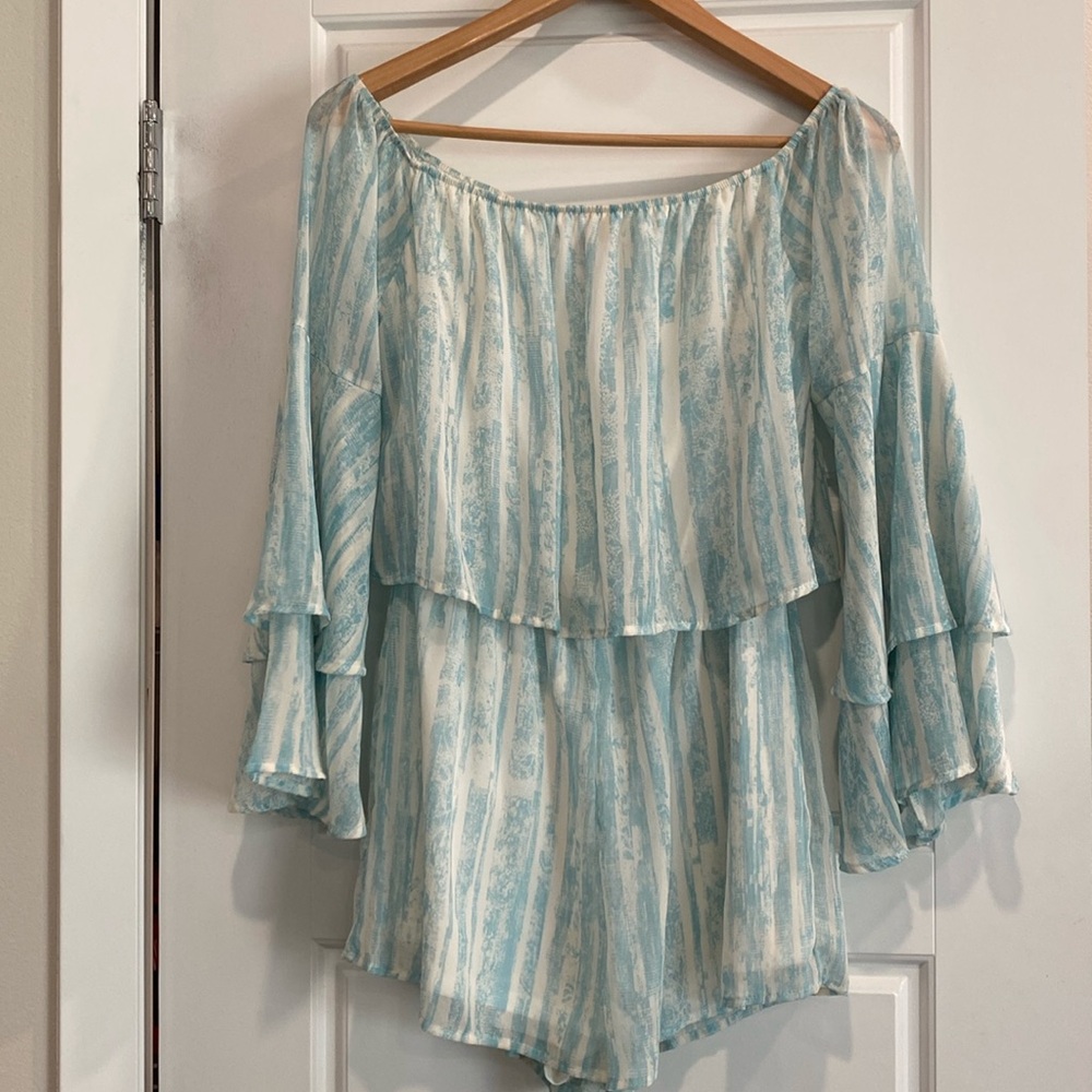 Pink lily size S. Blue and white romper